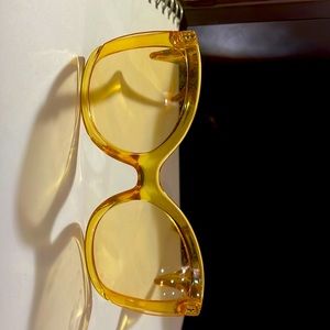 yellow golden glasses.